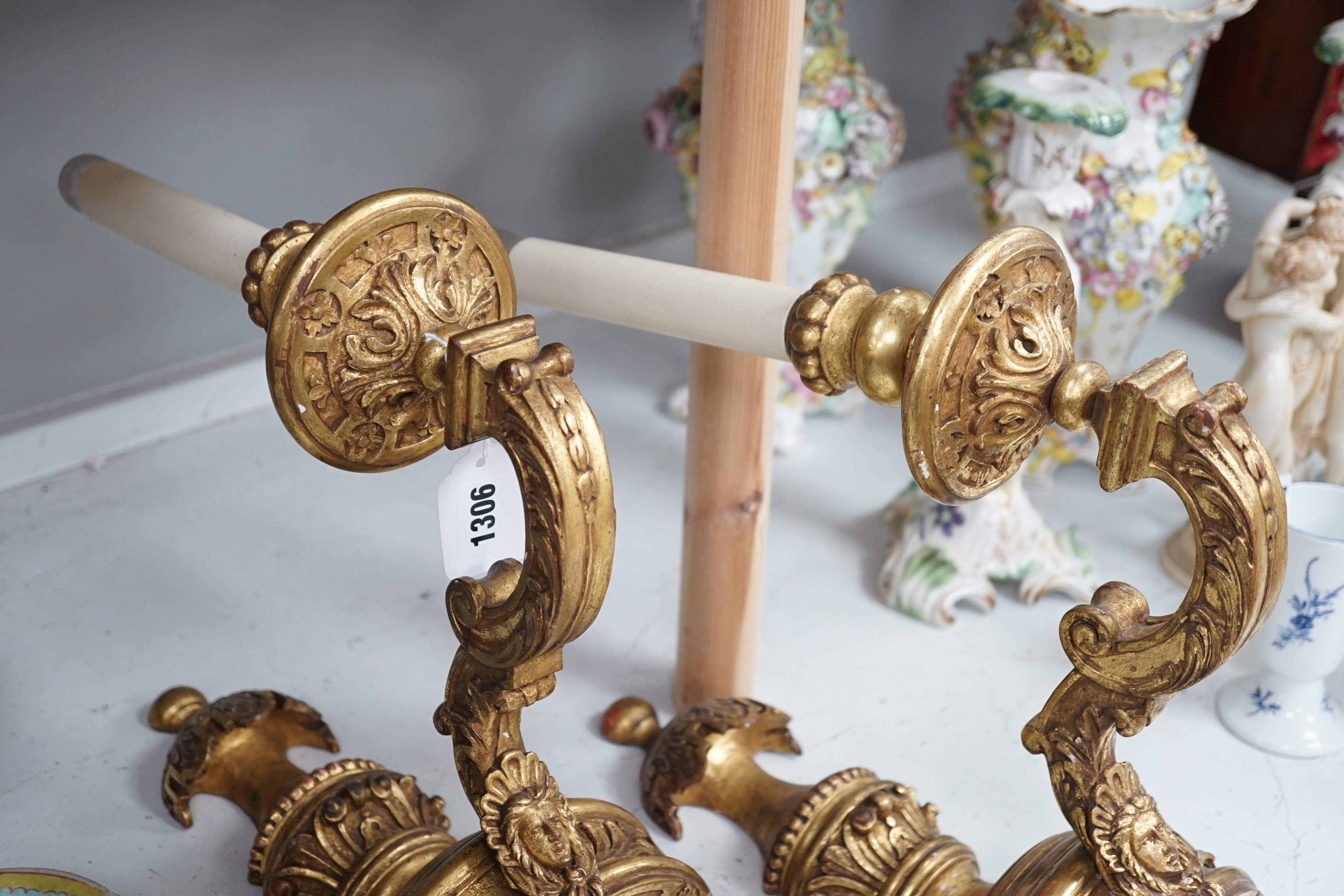 A pair of giltwood decorative single branch wall sconces - approx 50cm long